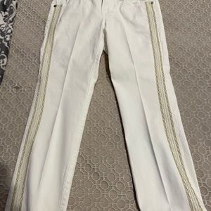 Woman’s Tommy Bahama white pants with gold trim on sides.  Size 0
